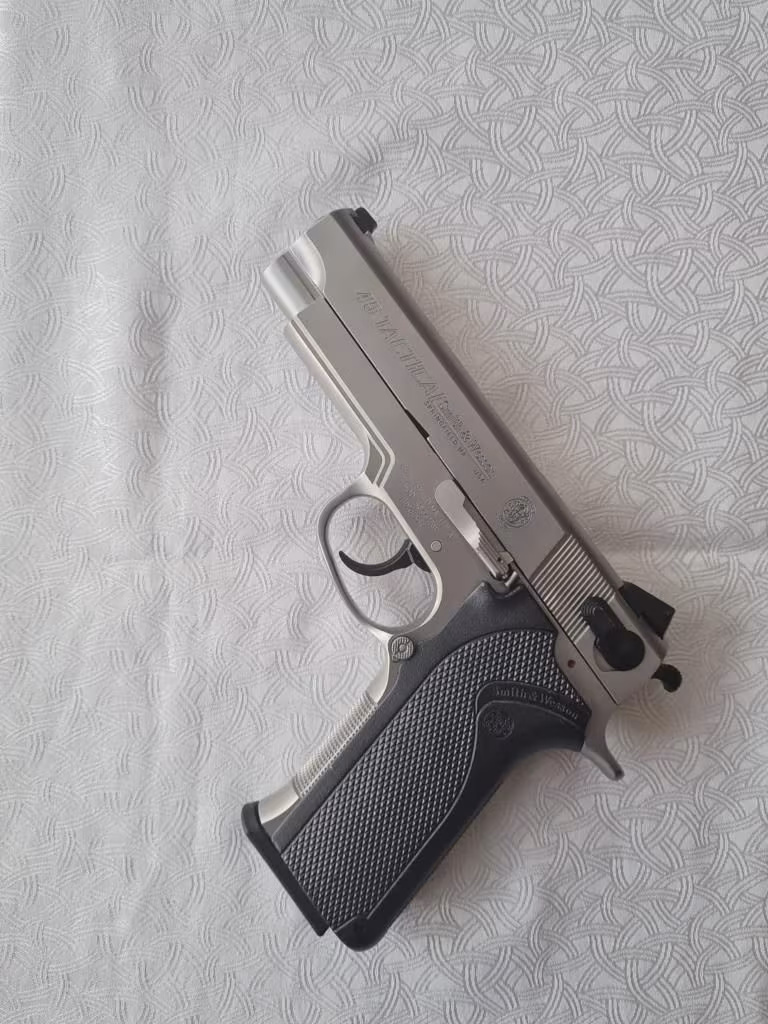 YARGI MENSUBUNDAN SMİTH WESSON 4566 MODEL TACTICAL SPORT,45 ACP ÇAPINDA SİLAH