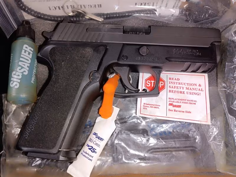 SIFIR SİGSUAR P229 AMERİKAN NİTRON SÜRGÜ ÇEKİLMEMİŞ ORİJİNAL KUTUSUNDA TÜM APARATLARI MEVCUT